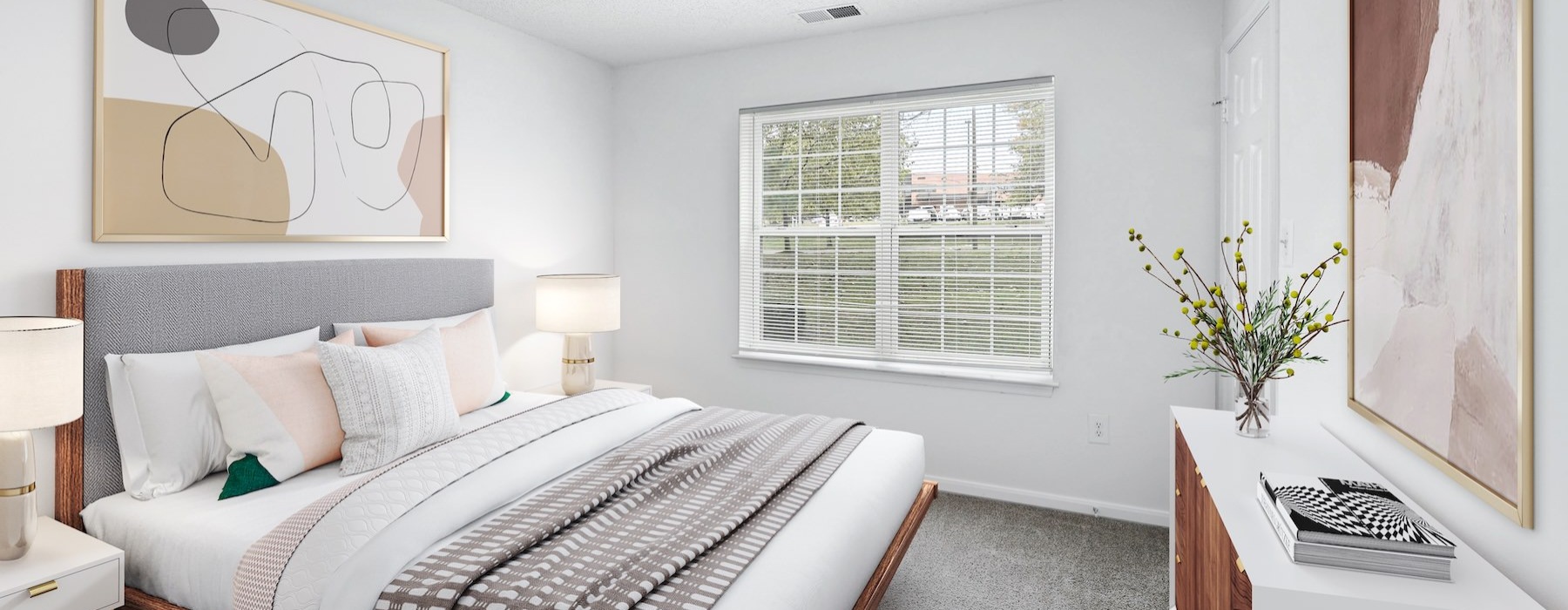 a bedroom with a bed and a desk