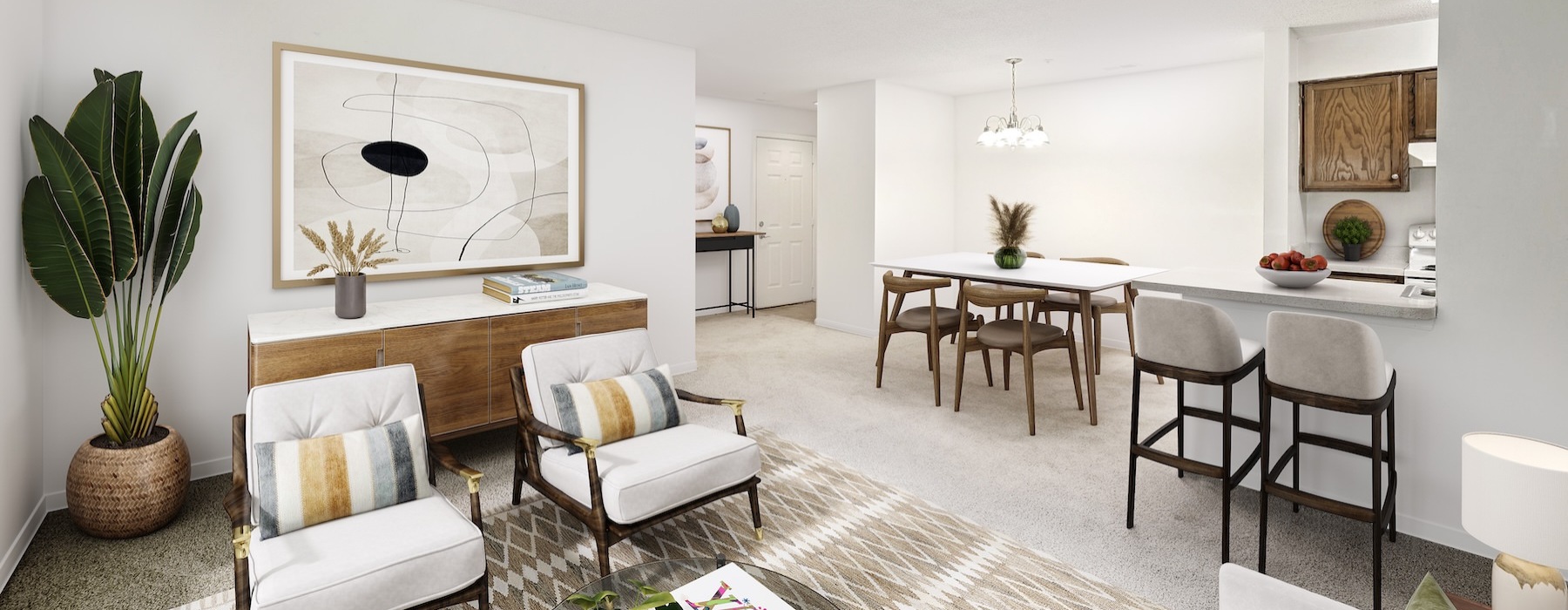a living room with a table and chairs